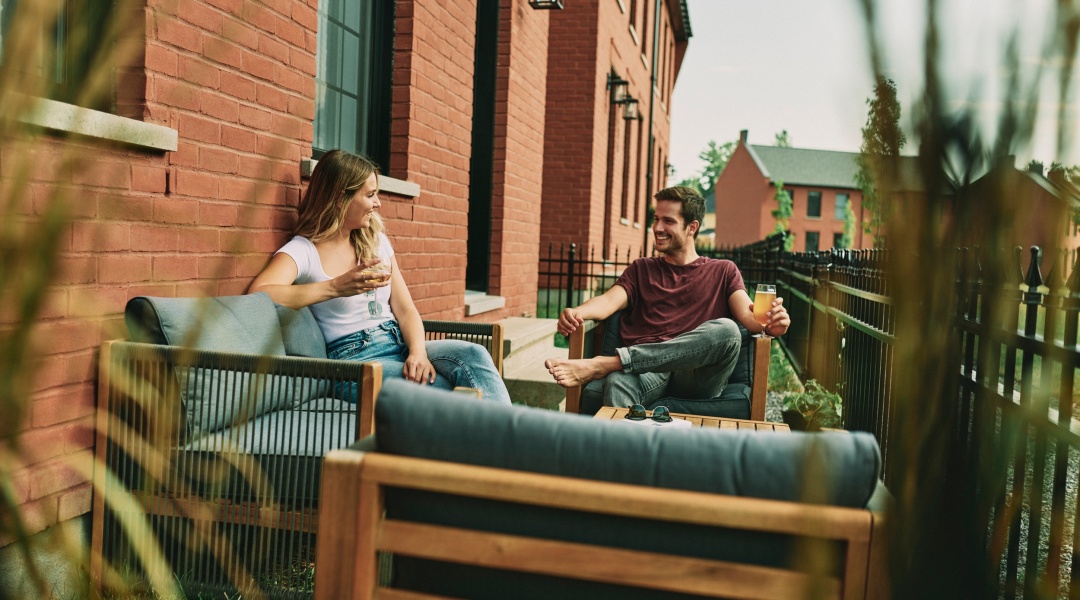 Young Couple in Front Garden