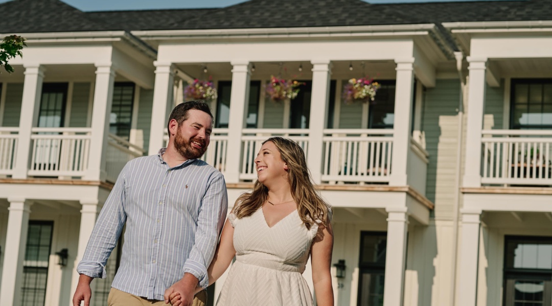Young Couple with Townhouses